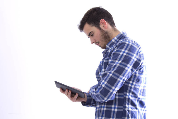 Young man using a tablet - Foto, Bild