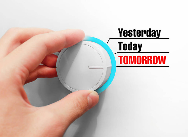 Male hand turns the switch. Switches days. Chose the Tomorrow - Foto, imagen