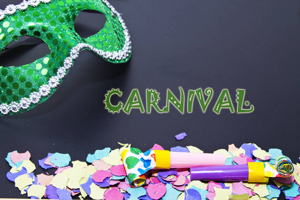 carnival mask and confetti and matasuegras - Fotografie, Obrázek