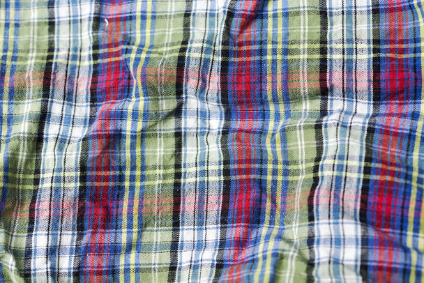 Плетена тканина з різними кольорами
. - Фото, зображення