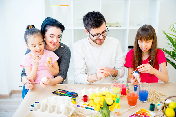 Family painting eggs - Photo, Image