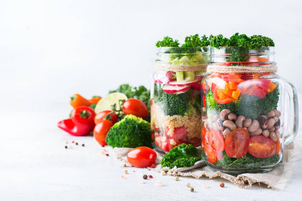 Healthy vegan salad in a mason jar with quinoa - Photo, Image