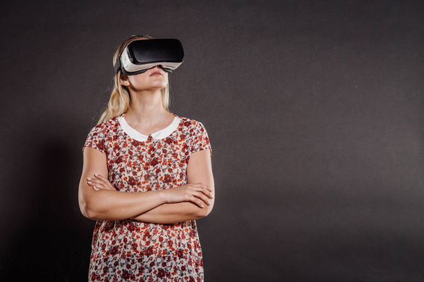 female with glasses of virtual reality. VR headset glasses devic - Φωτογραφία, εικόνα