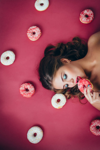   Girl with donuts - Photo, Image