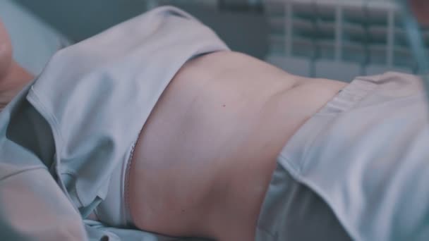 Young woman on ultrasound of abdominal cavity. - Metraje, vídeo