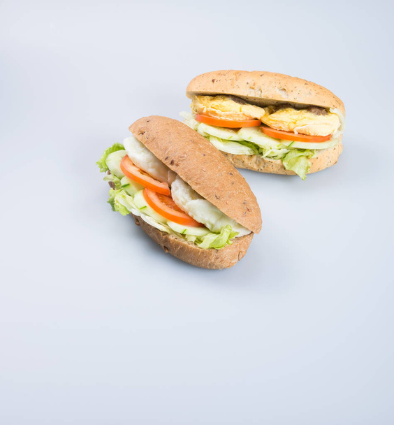 sandwich or tasty egg sandwich on background. - Foto, Imagem