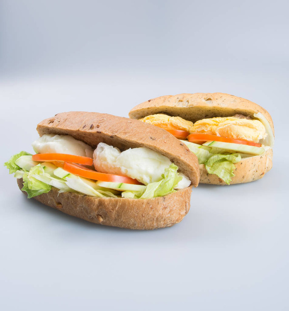 sandwich or tasty egg sandwich on background. - Foto, afbeelding