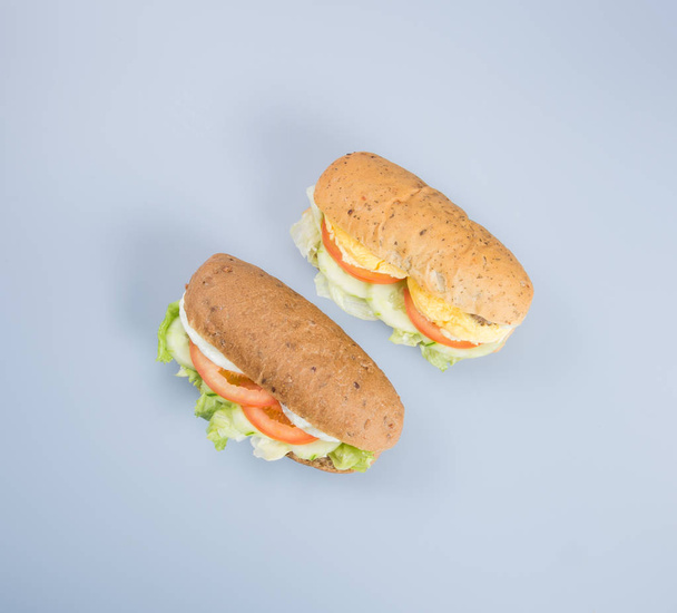 sandwich or tasty egg sandwich on background. - Valokuva, kuva