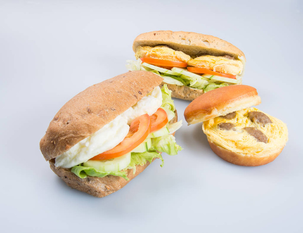 sandwich or tasty egg sandwich on background. - Foto, afbeelding