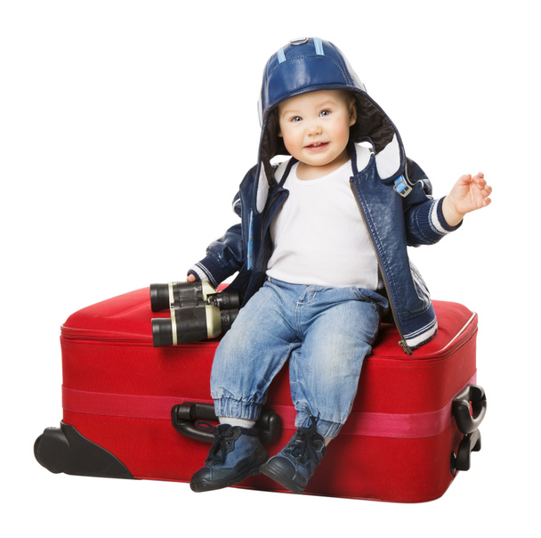 Maleta de bebé, Niño sentado en el equipaje de viaje, Niño con bolsa roja
 - Foto, imagen
