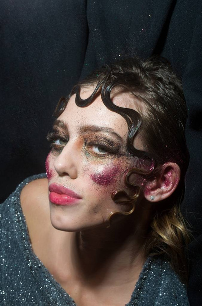 Pretty fashion girl with holiday glitter makeup - Zdjęcie, obraz
