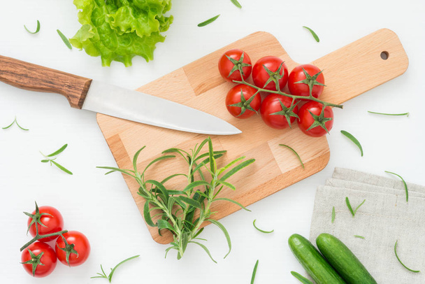 Fresh ingredients for delicious salad on wooden board ready for cooking - Φωτογραφία, εικόνα