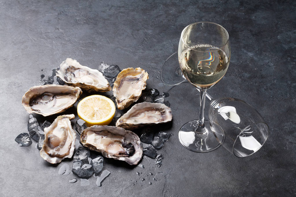 oysters, lemon and white wine glass - Photo, image