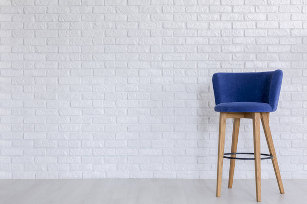 Blue chair in room - Фото, зображення