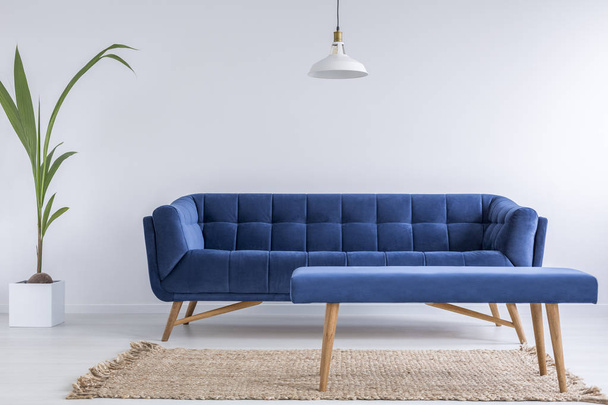 Quilted blue sofa and bench - Valokuva, kuva