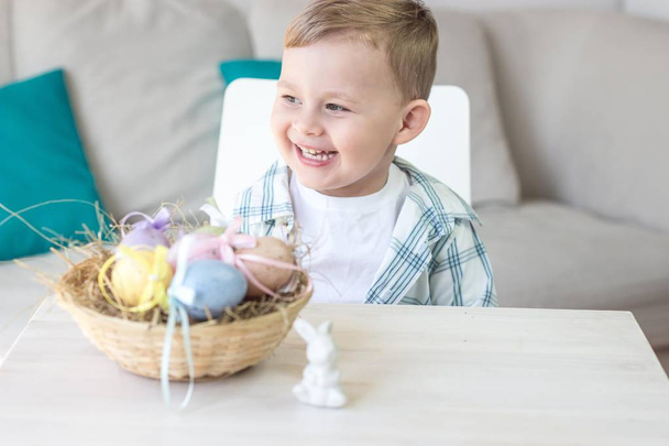 Cute little boy plays with Easter eggs and the Easter Bunny. Holidays. Spring. - Φωτογραφία, εικόνα