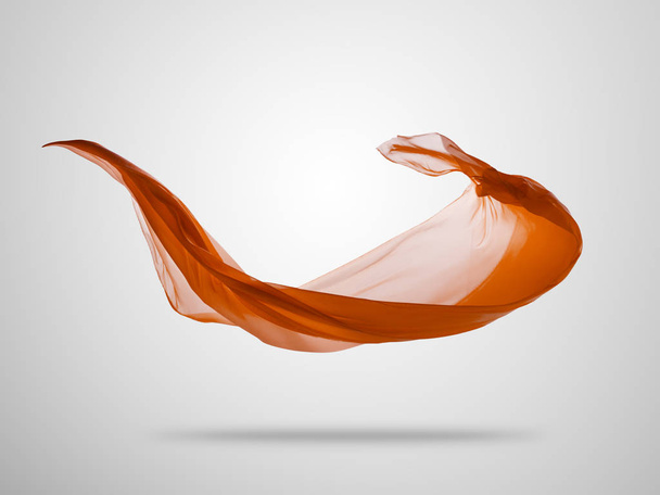 Smooth elegant orange cloth on grey background - Φωτογραφία, εικόνα
