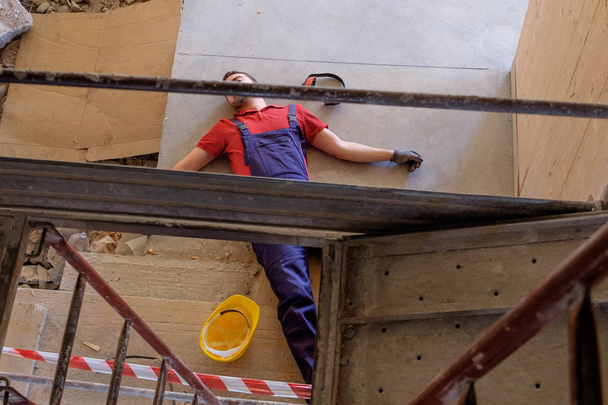 Worker in a faint  after  on-the-job injury - Photo, Image