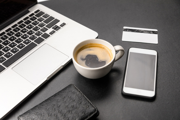 Cup of coffee and laptop  - Fotó, kép