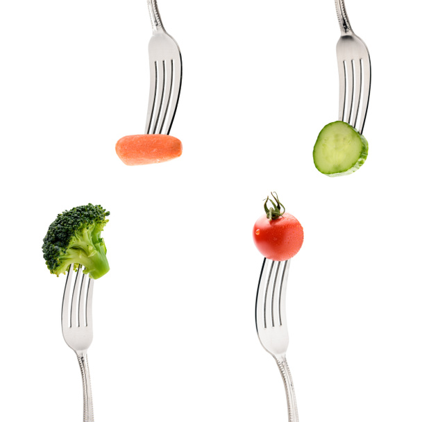 fresh vegetables on forks - Fotoğraf, Görsel
