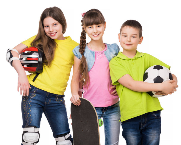 playful children holding sport equipment in hands - Foto, Imagem