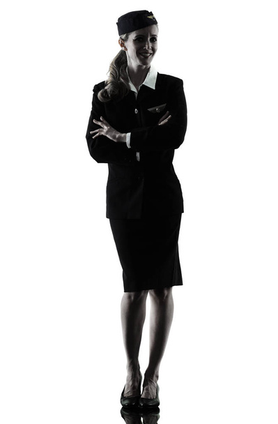 Stewardess cabin crew woman standing isolated silhouette - Photo, Image