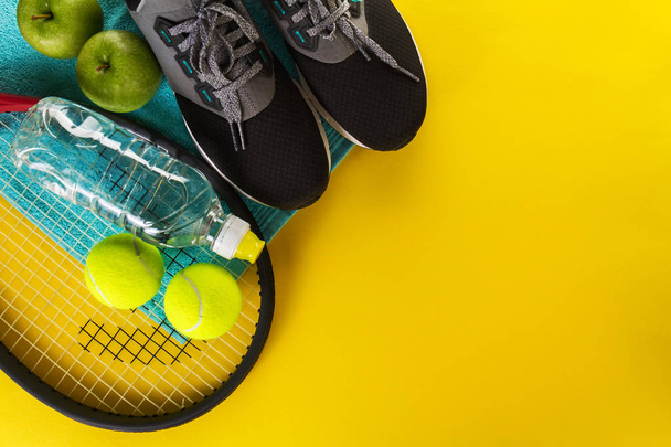 Healthy Life Sport Concept. Sneakers with Tennis Balls, Towel - Fotó, kép