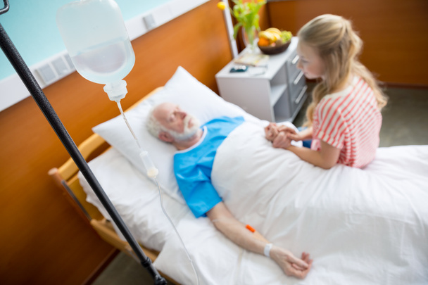 Grandfather and child in hospital  - Photo, Image