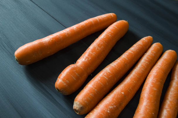 Orange carrots in various sizes, just carrot pictures - Foto, Imagen