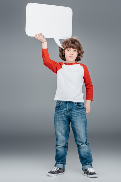 Little boy holding speech bubble - Photo, Image