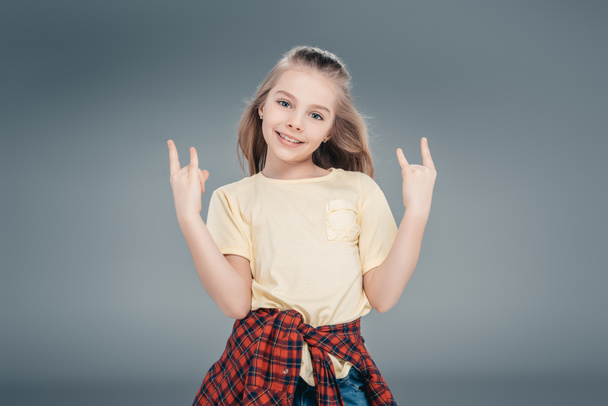 Girl gesturing rock sign - Photo, Image