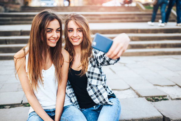 girls making selfie in the park - Valokuva, kuva