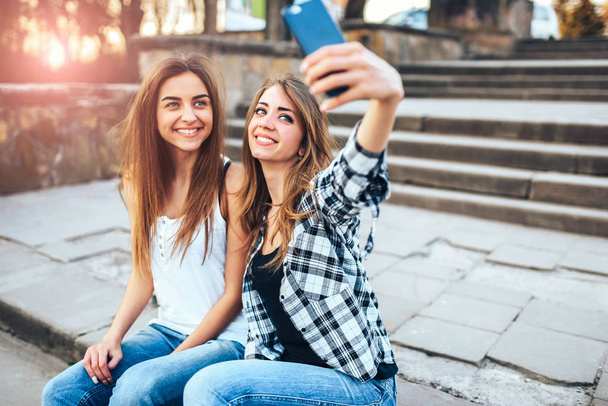 girls making selfie in the park - Valokuva, kuva
