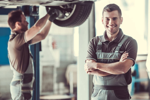 Handsome auto service workers - Photo, image