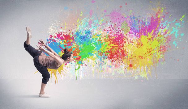 Young colorful street dancer with paint splash - Foto, Bild