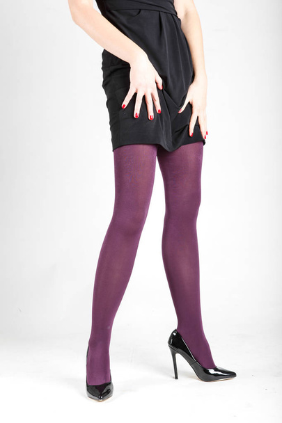 Woman's Legs Wearing Pantyhose and High Heels - Foto, afbeelding