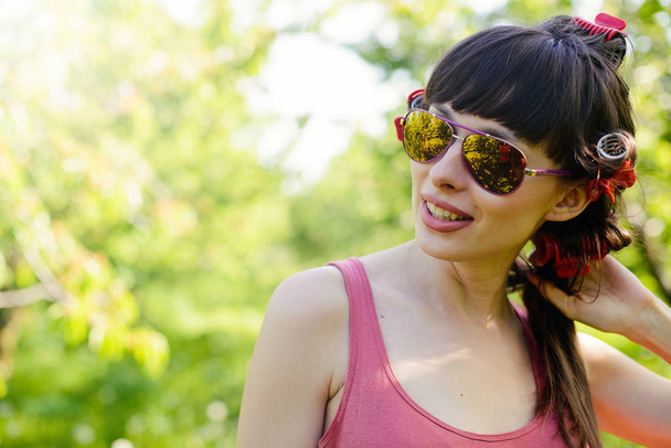 woman wearing sunglasses outdoors - Photo, Image