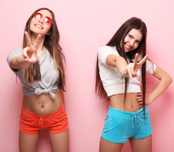 emotions, people, teens and friendship concept - two young teen - 写真・画像