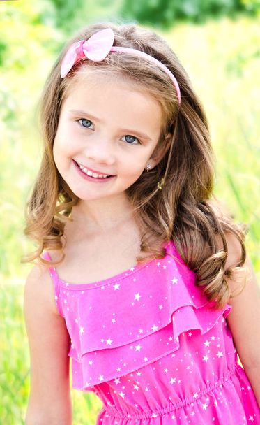 Portrait of adorable smiling little girl - Fotó, kép