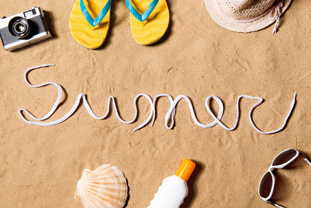 Summer vacation composition. Flip flops, hat and other stuff - Foto, imagen