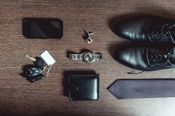 Accessories grooms wedding day. Wallet watch cufflinks tie shoes mobile phone car keys - Foto, Imagem