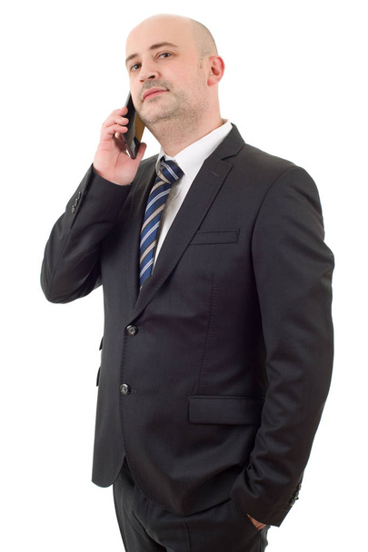 ανήσυχος επιχειρηματίας στο τηλέφωνο, απομονωμένος - Φωτογραφία, εικόνα