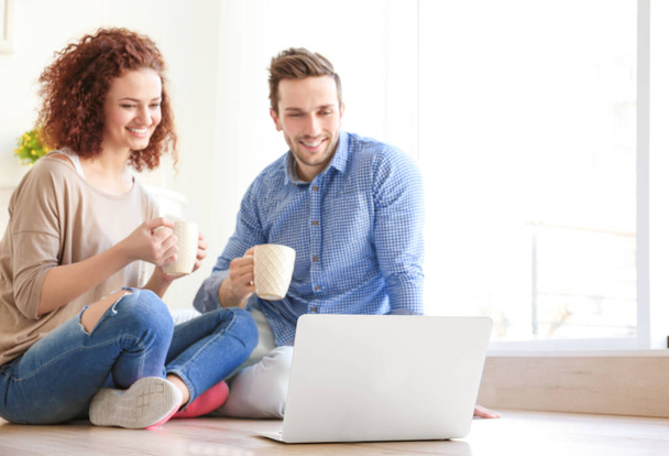 young couple with laptop  - Photo, Image