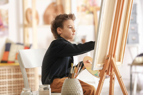 Cute little artist painting picture - Photo, Image