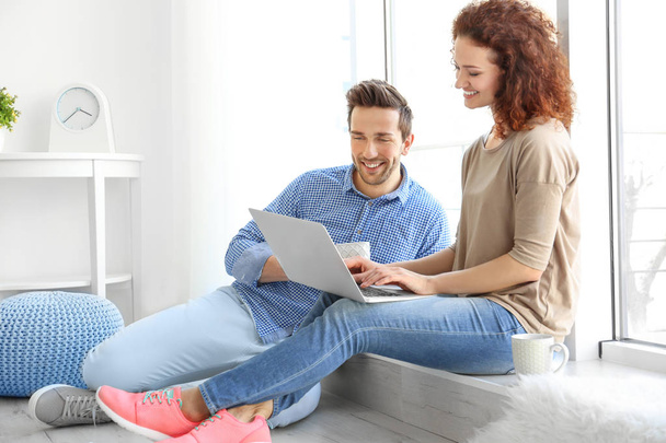 young couple with laptop  - Photo, image