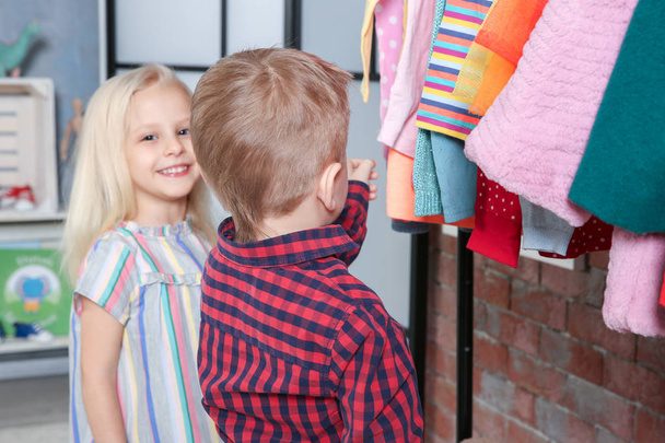 children choosing clothes - Foto, immagini