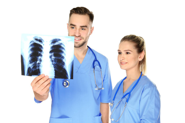 Doctor and medical assistant with x-ray  - Fotoğraf, Görsel