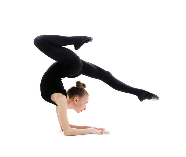 Young girl doing gymnastics - Fotó, kép