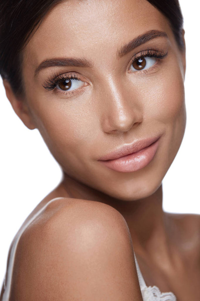 Beauty Face. Woman With Soft Skin And Perfect Makeup. Cosmetics - Valokuva, kuva
