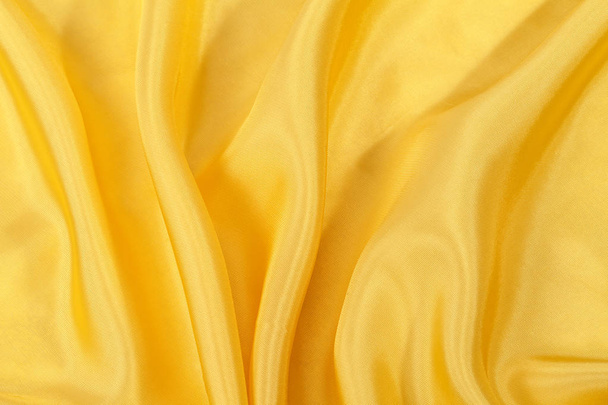 İpek arka plan, sarı parlak kumaş dokusuna - Fotoğraf, Görsel